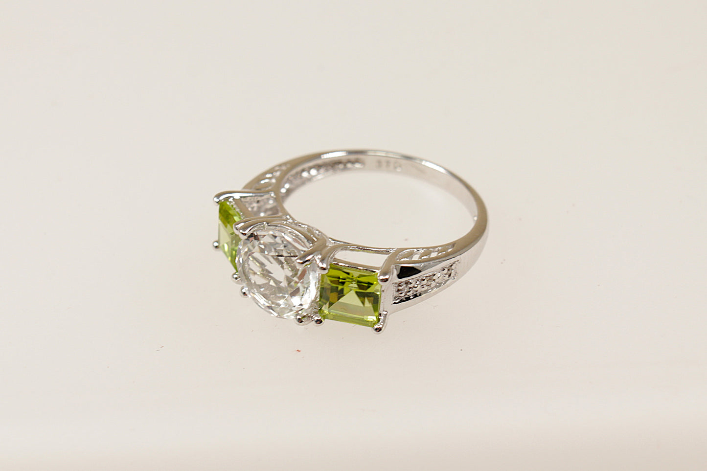9ct White Gold Topaz and Peridot Trilogy Ring