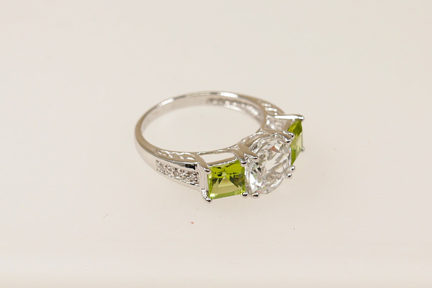 9ct White Gold Topaz and Peridot Trilogy Ring