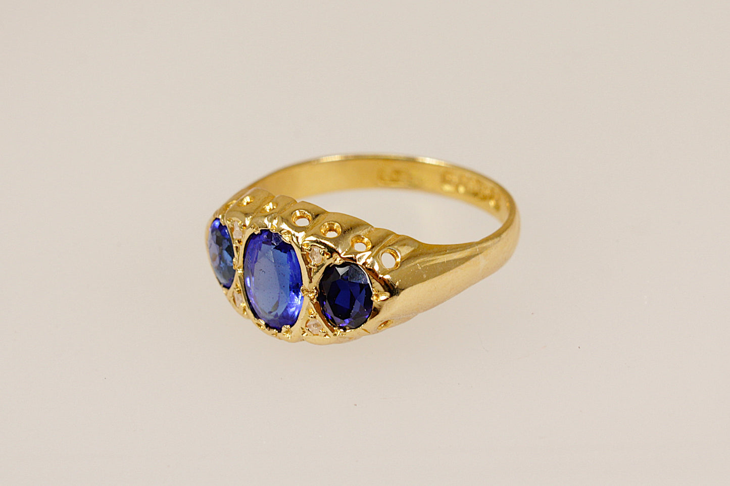 Edwardian 18ct Gold Blue Gemstone Trilogy Ring