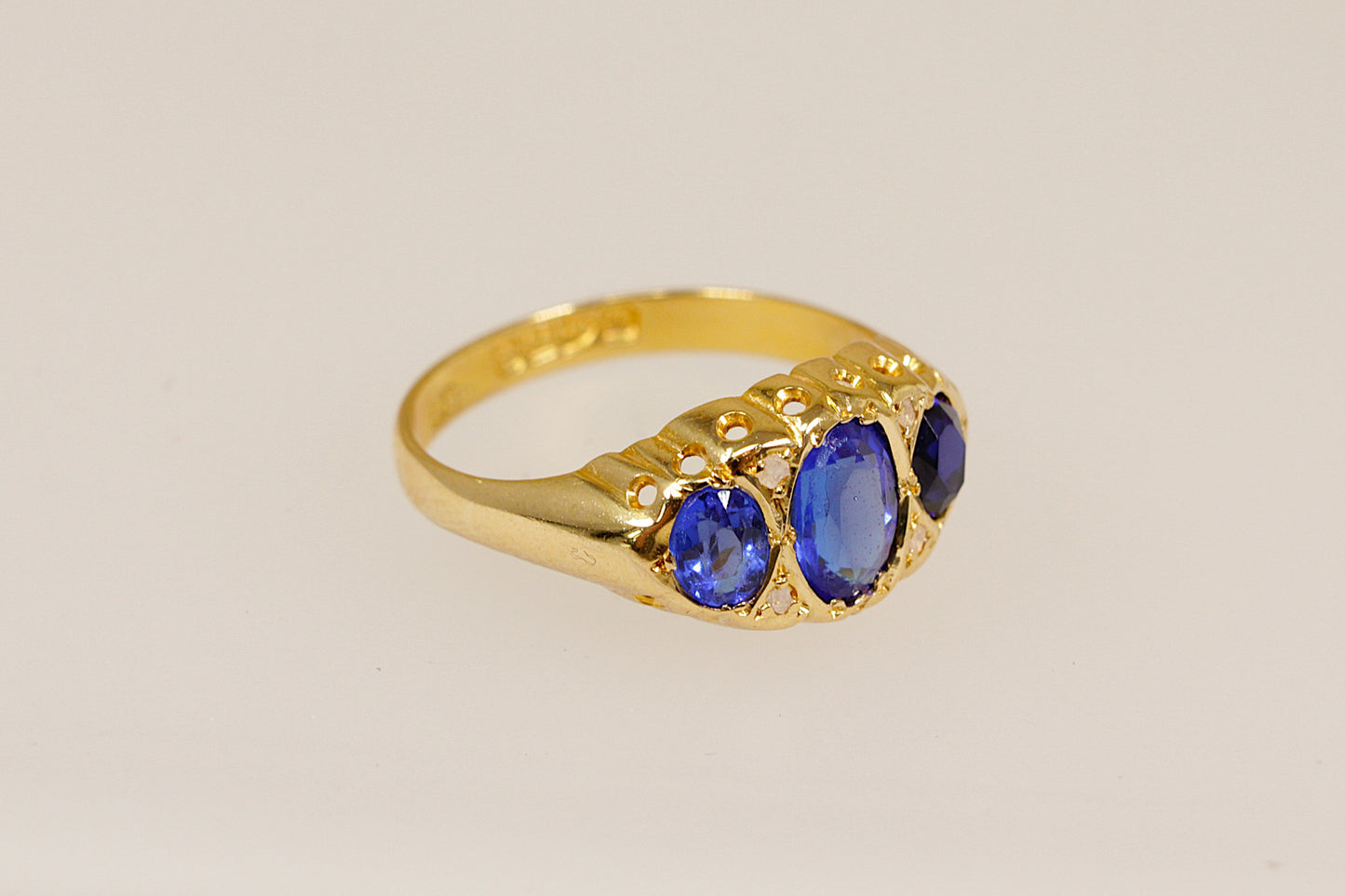 Edwardian 18ct Gold Blue Gemstone Trilogy Ring