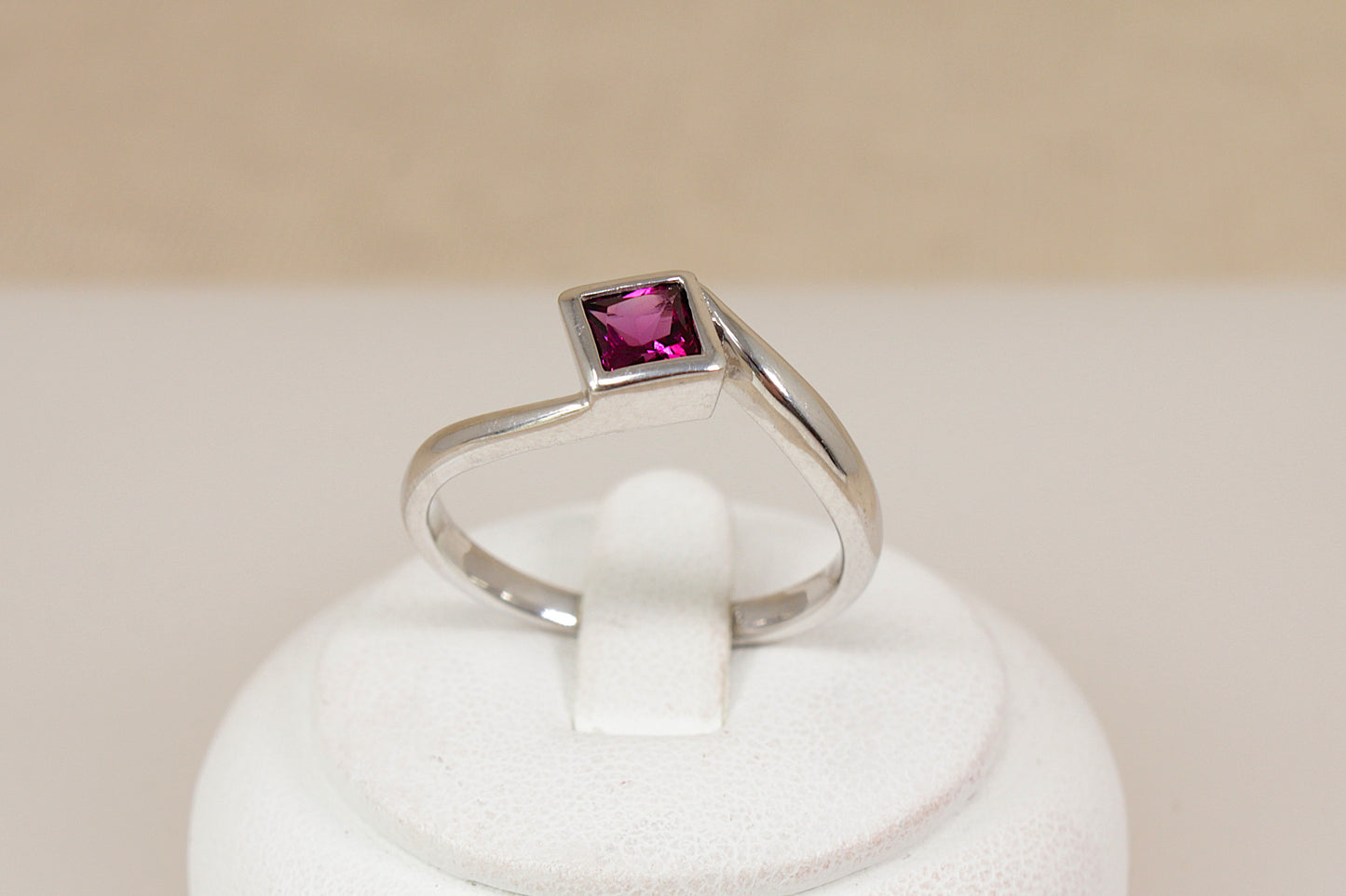 Elegant Sterling Silver Rhodolite Garnet Twist Ring
