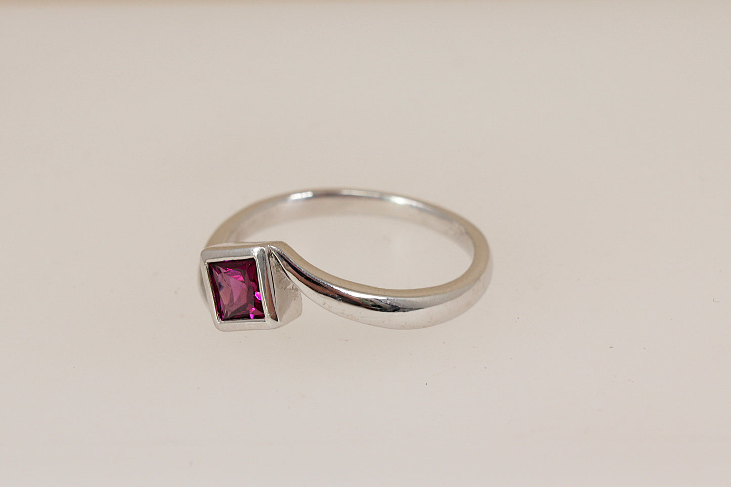 Elegant Sterling Silver Rhodolite Garnet Twist Ring