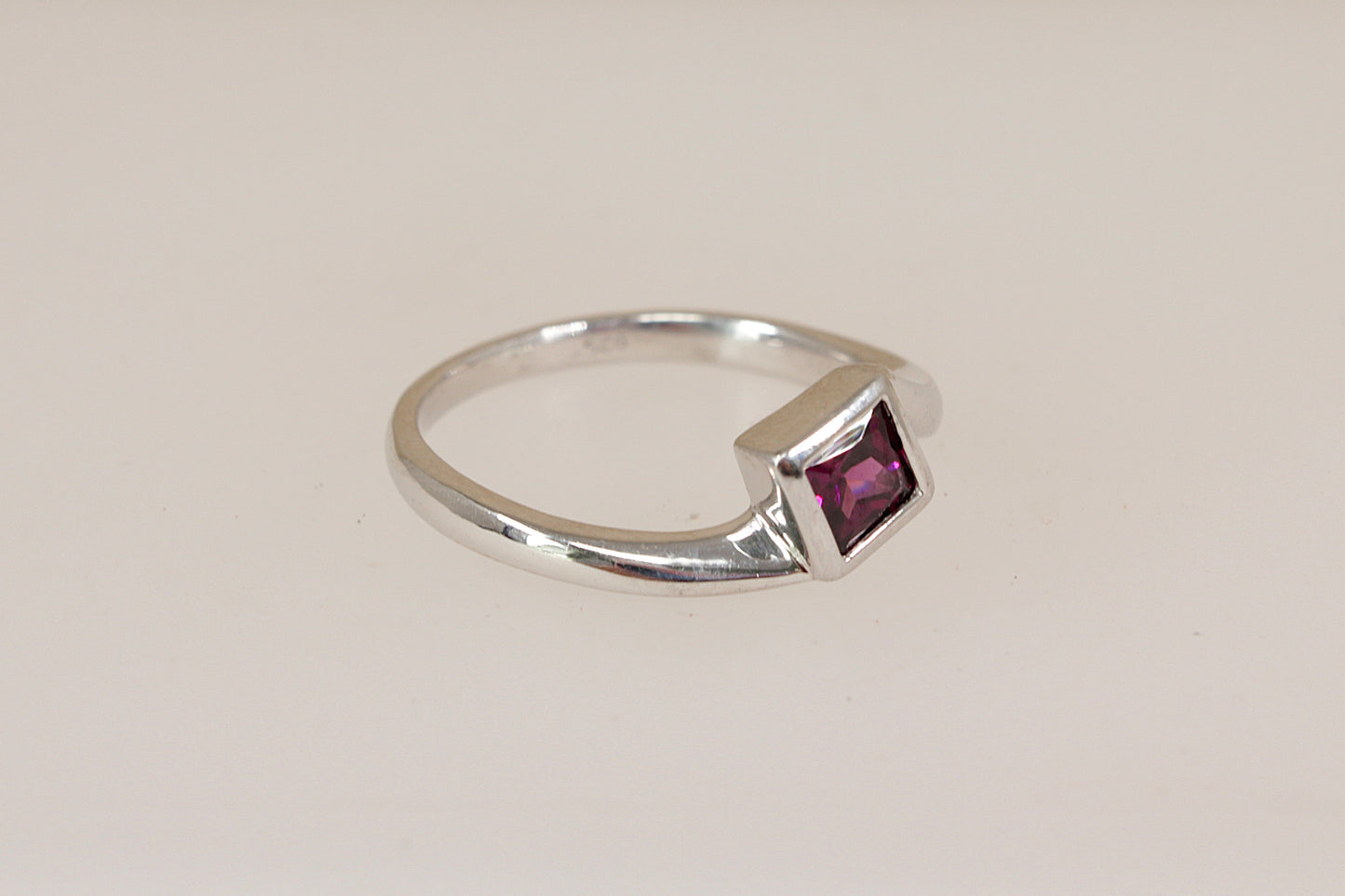 Elegant Sterling Silver Rhodolite Garnet Twist Ring