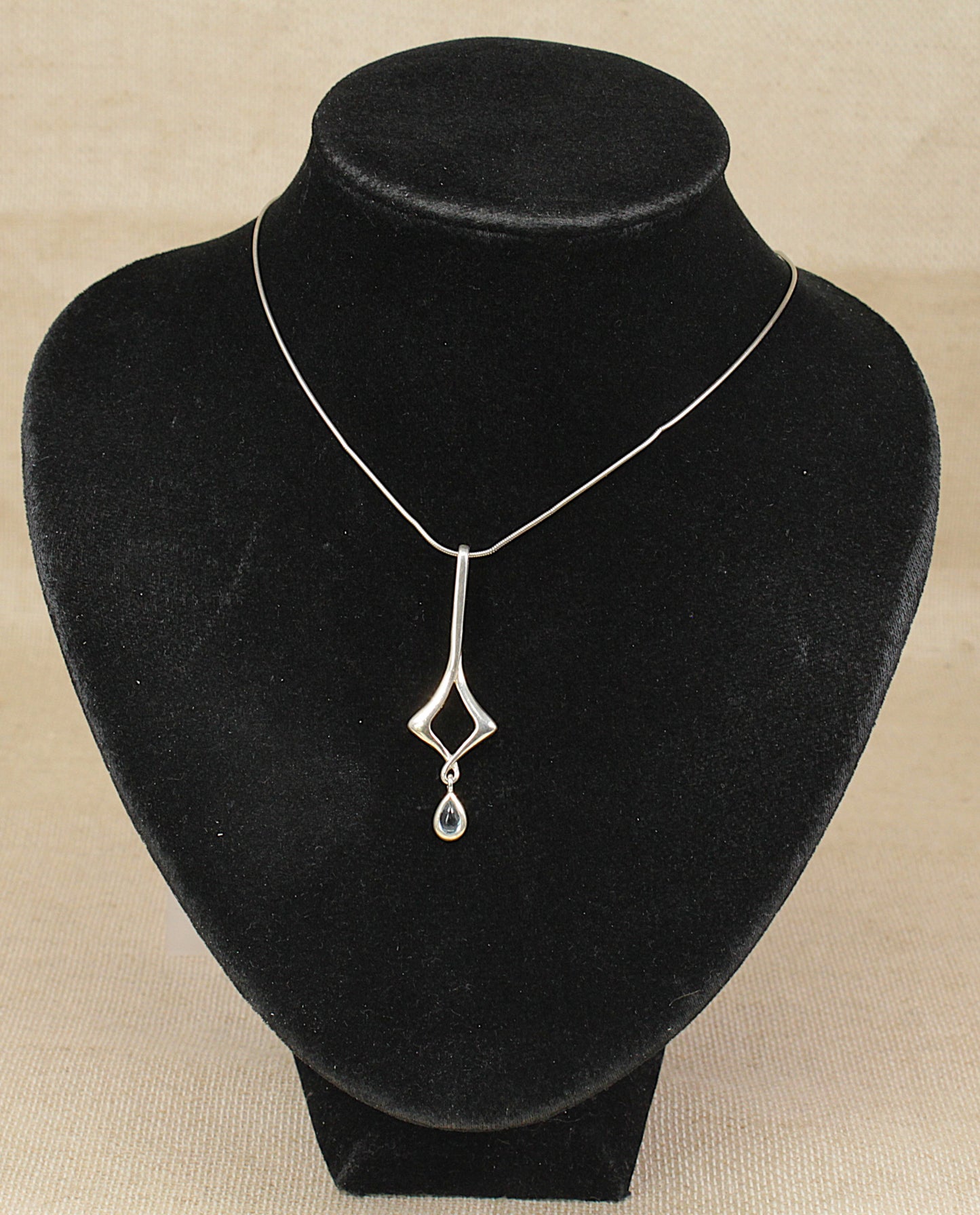 Stylish Sterling Silver & Blue Topaz Pendant by Kit Heath