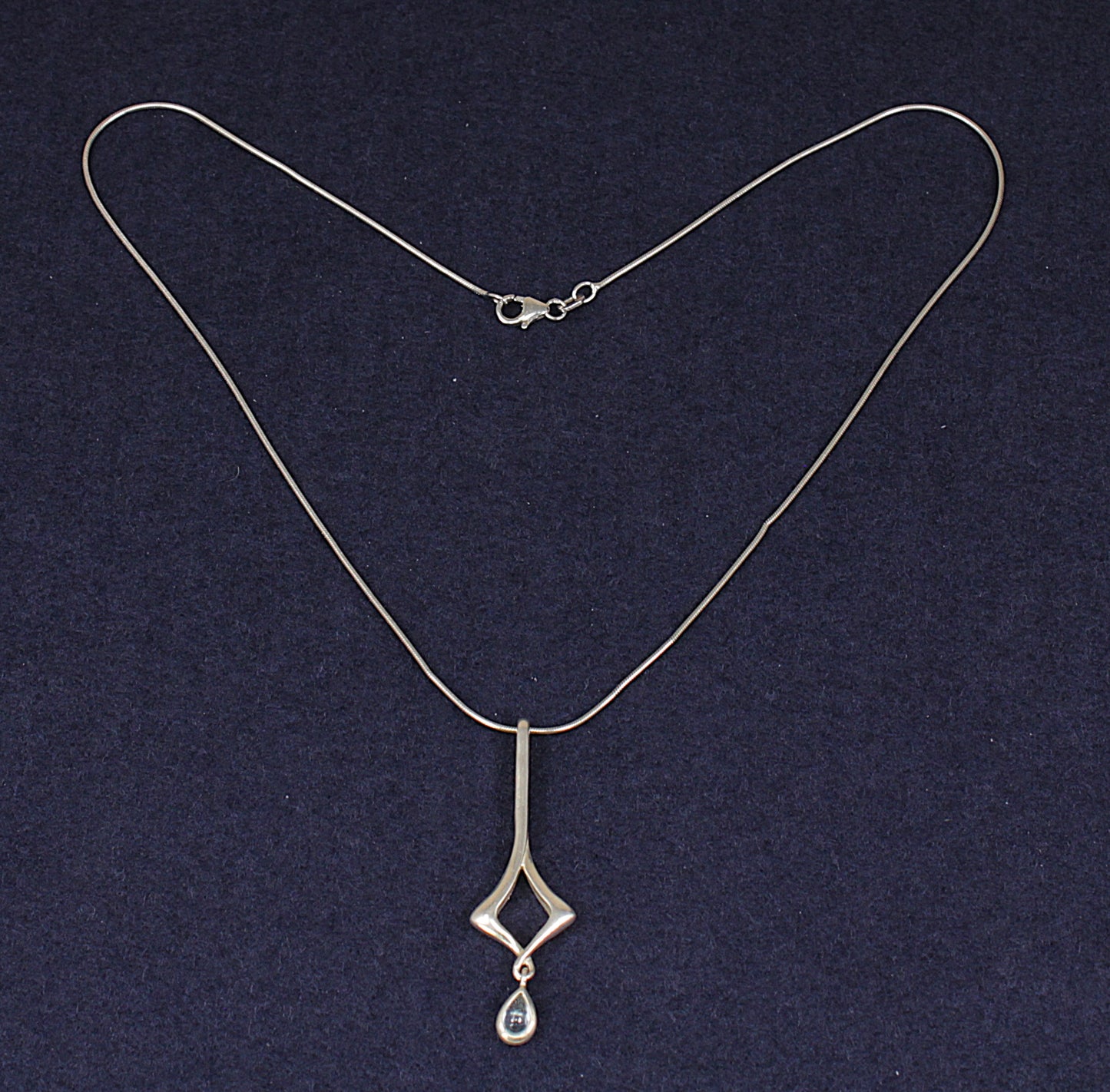 Stylish Sterling Silver & Blue Topaz Pendant by Kit Heath