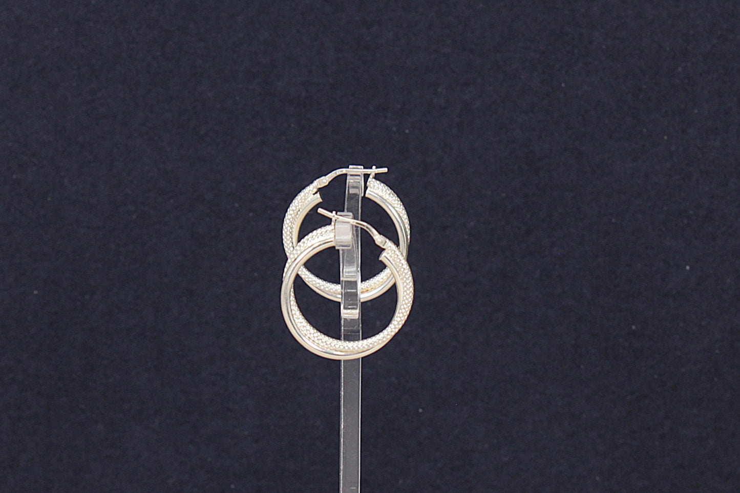 Charming Sterling Silver Intertwined Hoop Earrings
