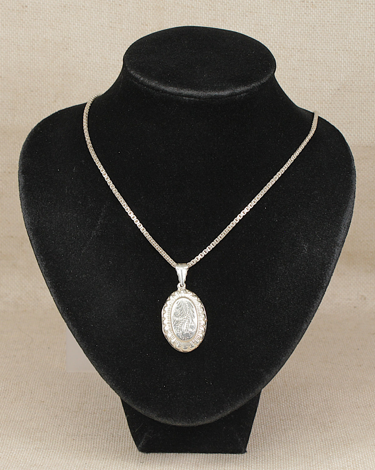 Elegant Sterling Silver Oval Opening Locket Necklace