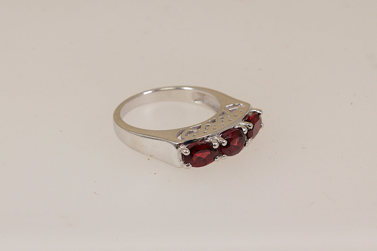 Stylish Sterling Silver Garnet Trilogy Ring