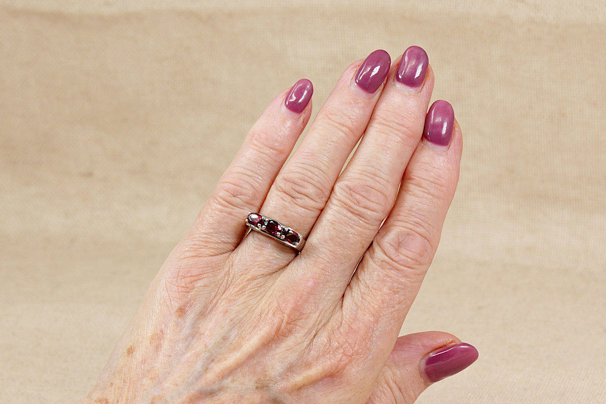Stylish Sterling Silver Garnet Trilogy Ring