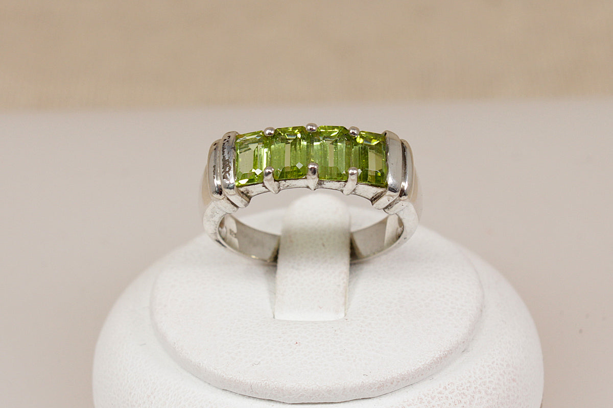 Elegant Sterling Silver Four Stone Peridot Ring