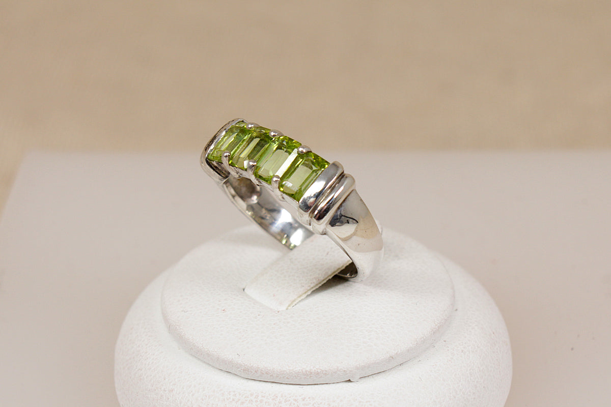 Elegant Sterling Silver Four Stone Peridot Ring