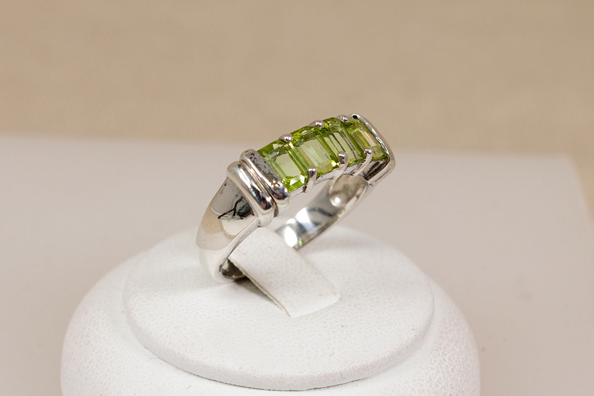 Elegant Sterling Silver Four Stone Peridot Ring