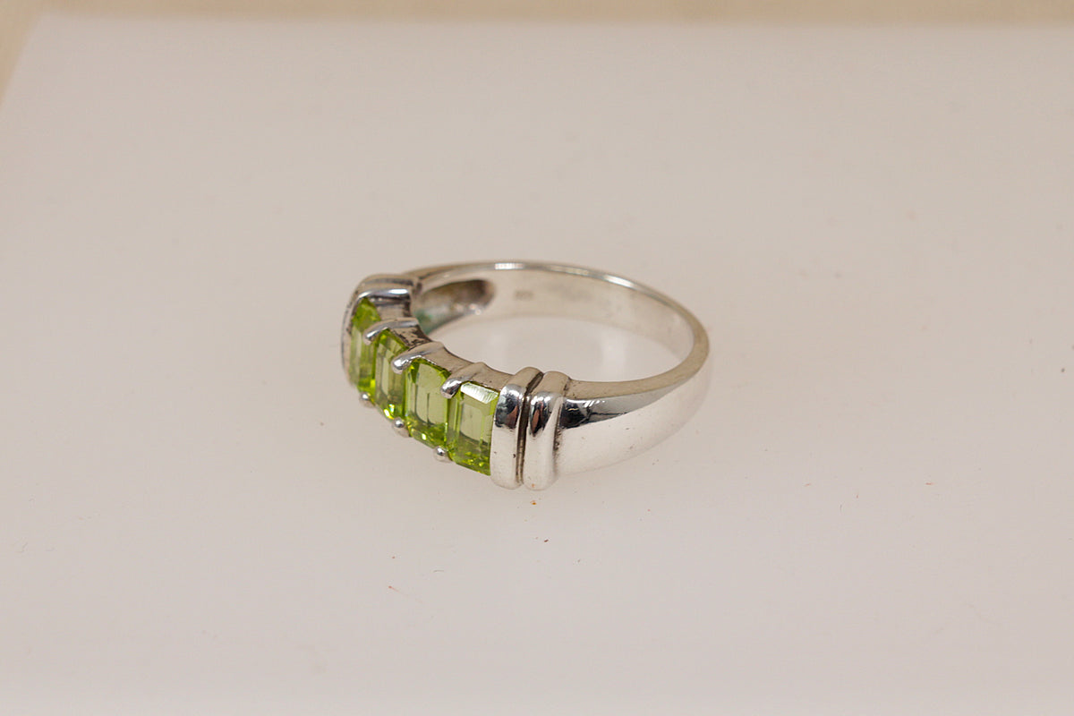 Elegant Sterling Silver Four Stone Peridot Ring