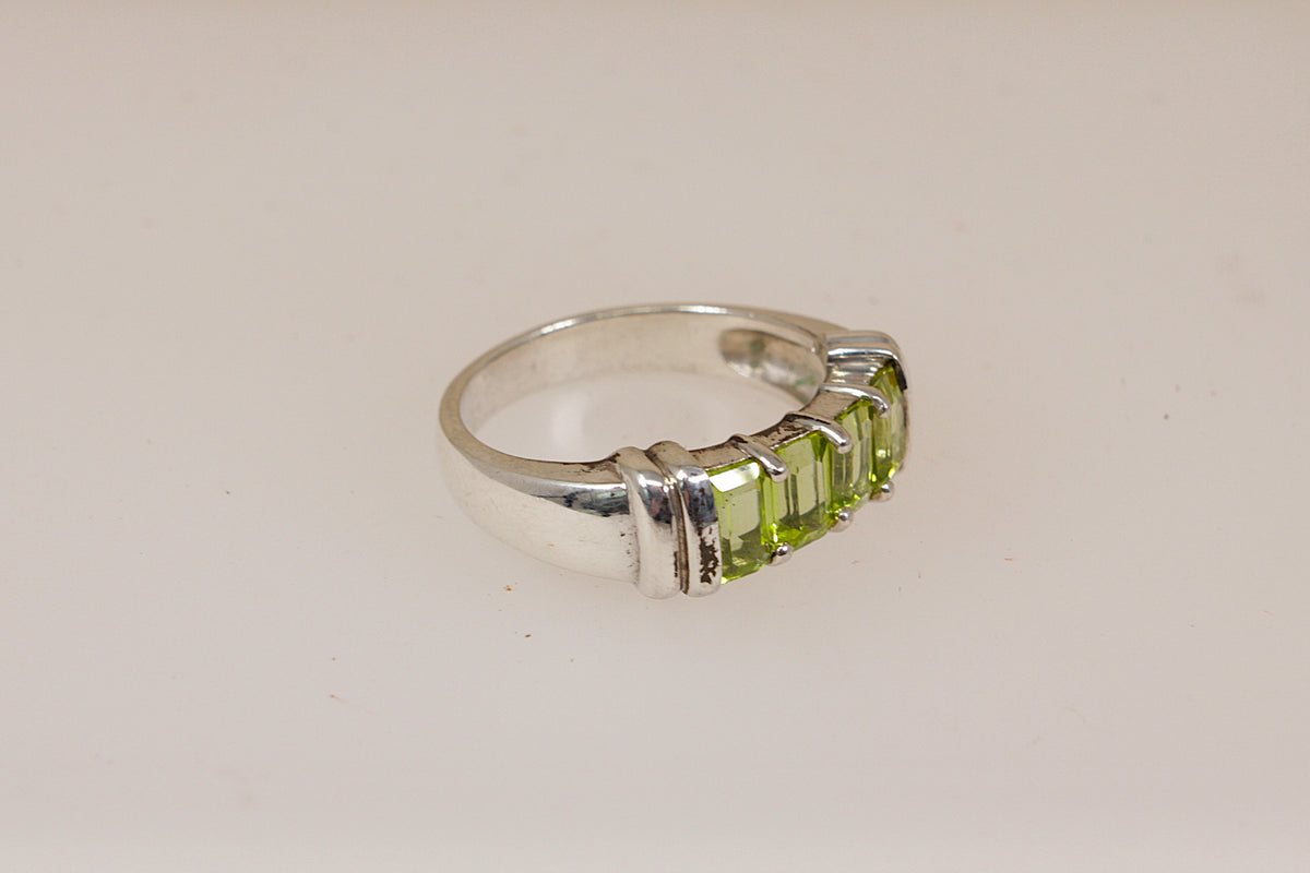 Elegant Sterling Silver Four Stone Peridot Ring