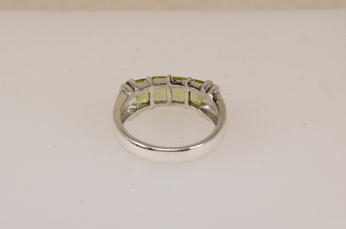 Elegant Sterling Silver Four Stone Peridot Ring