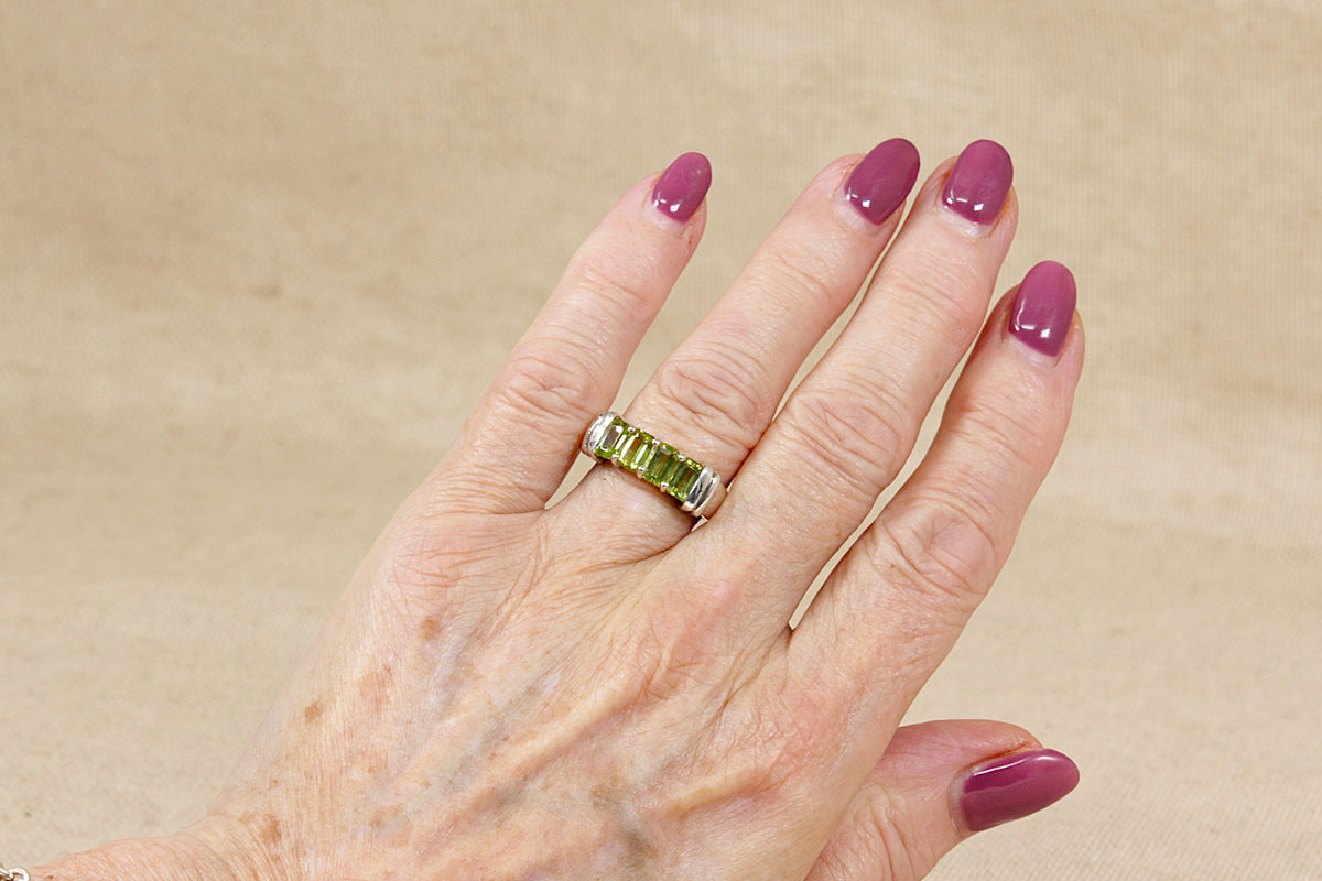 Elegant Sterling Silver Four Stone Peridot Ring