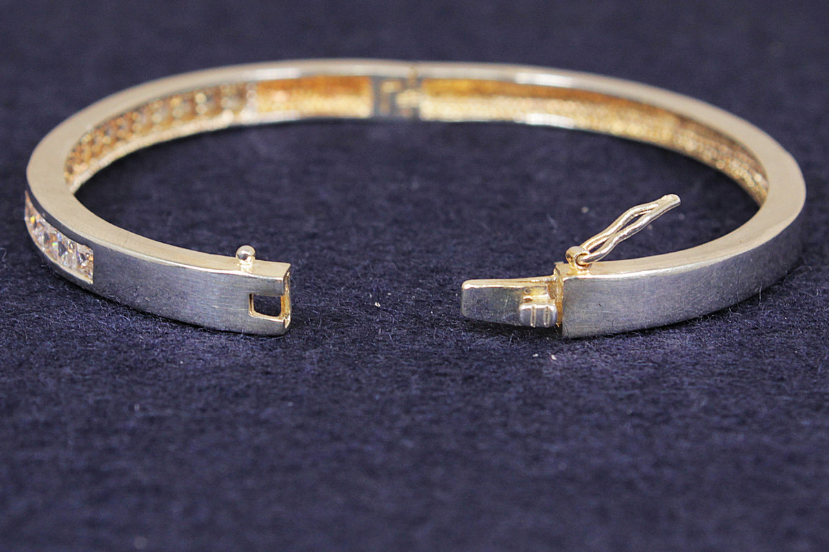 Stylish Sterling Silver Hinged Bangle with Square-Cut C.Z. Gemstones